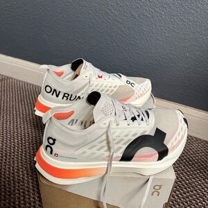 ON Running White and Orange Sneakers